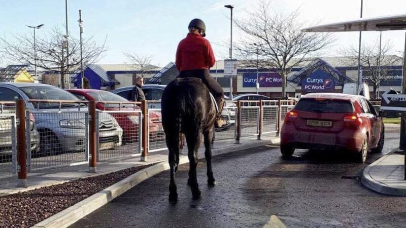 Yazmin O&#39;Reilly, from Newry, pictured on the back of her horse, Kizzi, at the McDonald&#39;s drive-thru in Newry 