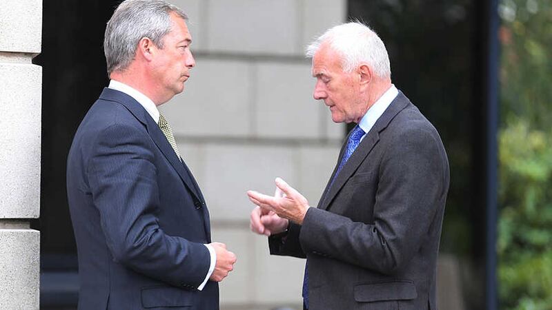 In this file photo, David McNarry (right) speaks to Ukip leader Nigel Farage. Mr McNarry this morning said he was in favour of deporting foreign doctors who receive parking fines