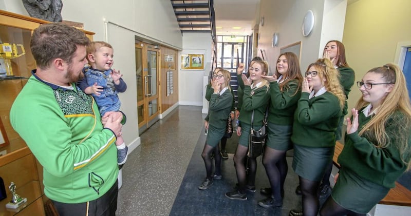 Some of the pupils from Col&aacute;iste Feirste who registered to became organ donors in support of little D&aacute;ithi Mac Gabhann who needs a heart transplant. Picture Mal McCann. 