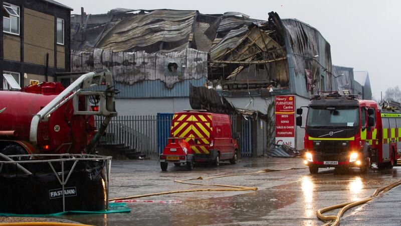 Fire fighters at the scene of the blaze on an industrial estate outside Newry. Picture by NIFRS