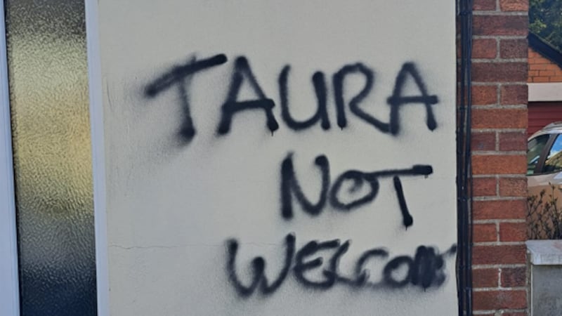 Police are investigating graffiti that appeared in Finaghy on Sunday morning as a hate crime.