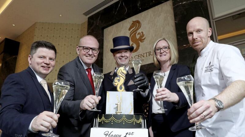 Pictured celebrating the first year anniversary of the Grand Central Hotel are (from left) Damien McDonald, food &amp; beverage manager; Stephen Meldrum, general manager; Ian Jameson, concierge; Deborah Galloway, deputy general manager and Damian Tumilty, executive head chef 