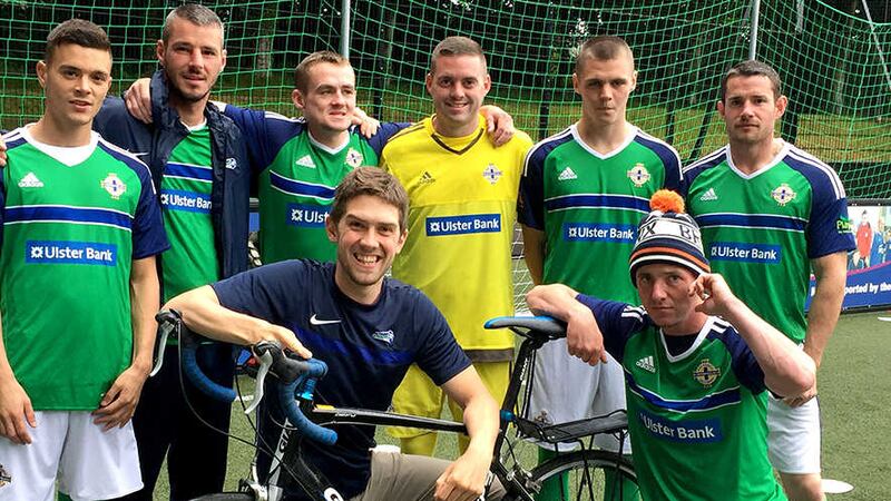 Dr Stephen Collins (27) from Coleraine in Co Derry, with the Street Soccer NI team. The doctor cycled the length of France to support the Northern Ireland football team and has raised just over &pound;3,000 for a homeless charity&nbsp;