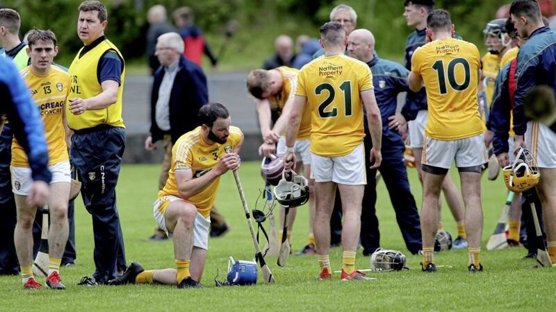 Antrim players dejected at the final whistle in the Joe McDonagh Cup semi-final.<br />Picture  Seamus Loughran