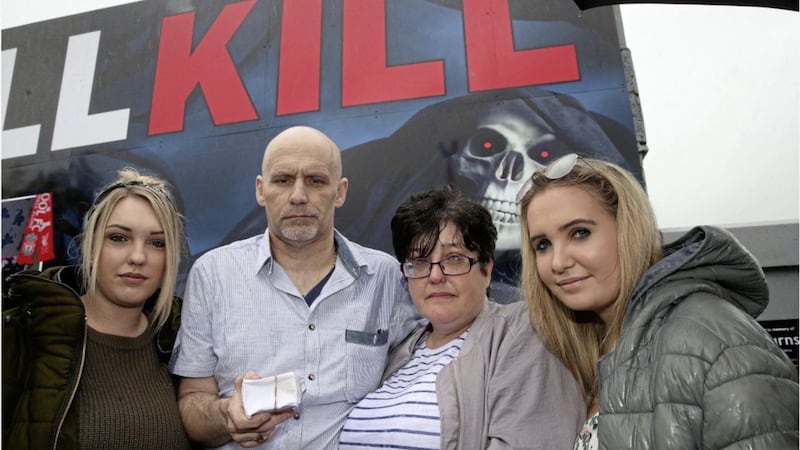 Drug victim Jamie Burns&#39;s parents William and Lesley with family in north Belfast. Picture by Hugh Russell 