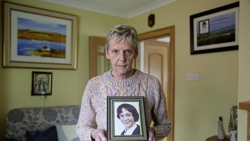 Noreen Brennan with a picture of her brother Kieran Murray, who was shot dead while travelling in a car along Slate Quarry Road, near Pomeroy, Co Tyrone, in 1985. Picture by Mal McCann 