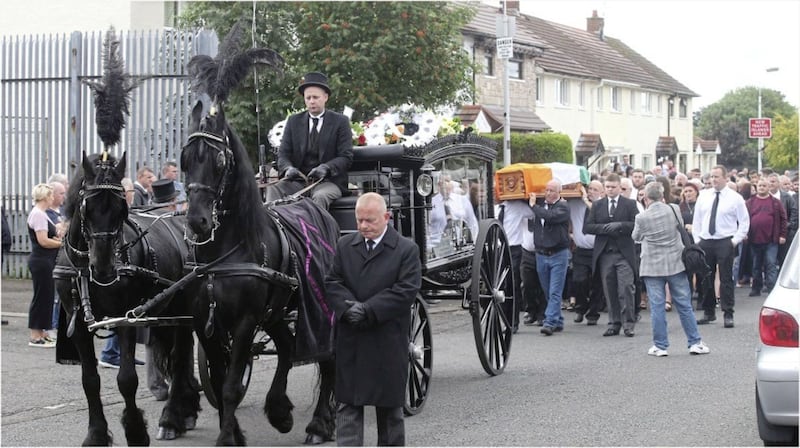 The funeral of Seamus Conlon on the way to Corpus Christi Church in Wsy Belfast Piture by Hugh Russell. 