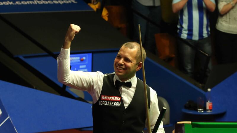 Barry Hawkins celebrates beating Ronnie O'Sullivan during day 10 of the Betfred Snooker World Championships at the Crucible on Monday<br />Picture by PA&nbsp;