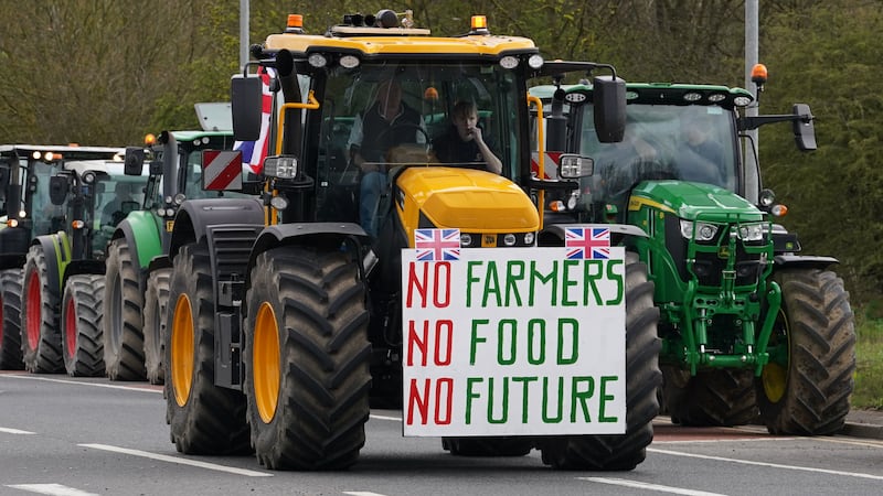 Farmers take part in a tractor ‘go-slow’ near the Palace of Westminster