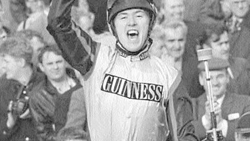 Antrim man Tony McCoy punches the air after his mount &#39;Mr Mulligan&#39; charged to victory in the 1997 Tote Cheltenham Gold Cup. 