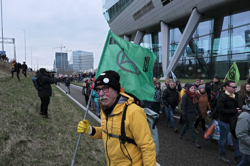 Climate activists gather to block the main route around Amsterdam (Patrick Post/AP)