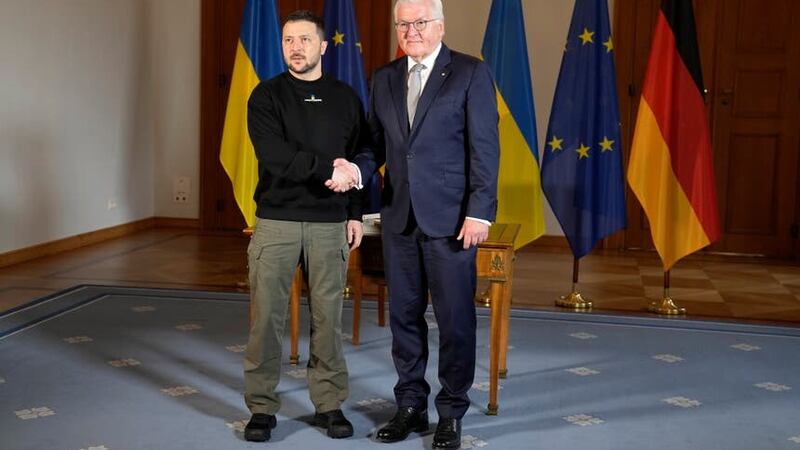 Germany’s President Frank-Walter Steinmeier greets Ukraine’s President Volodymyr Zelensky at the Bellevue Palace in Berlin (Matthias Schrader/AP)