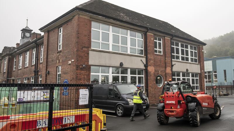 Workmen at Abbey Lane Primary School in Sheffield, which has been affected with sub-standard reinforced autoclaved aerated concrete (Raac) (Danny Lawson/PA)