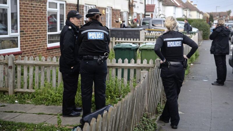 Police investigating the stabbing in Stanwell. Picture by Steve Parsons/PA 