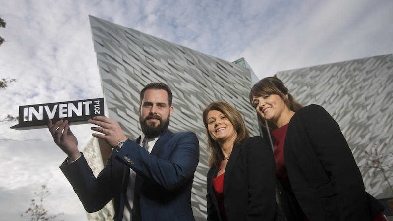PlotBox founders Sean and Leona McAllister pictured at Titanic Belfast after winning the INVENT 2014 trophy. Julie-Ann O&#39;Hare of the awards sponsors, Bank of Ireland is also pictured 