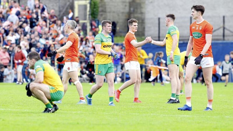 Armagh and Donegal players at the end of the All-Ireland SFC round two between Armagh and Donegal at St Tiernach&#39;s Park, Clones Picture: Philip Walsh. 