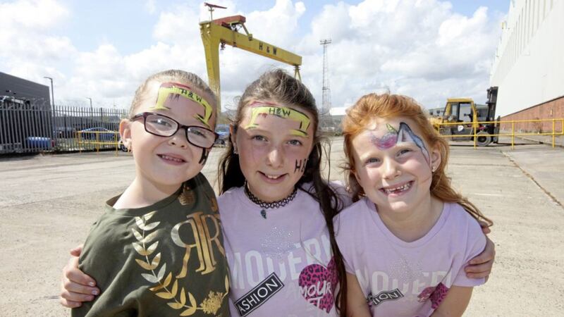 Casey Martin (5) with Casey Waite (10) and her sister Poppy (6) at the family fun day at the Harland and Wolff protest site. Picture by Ann McManus