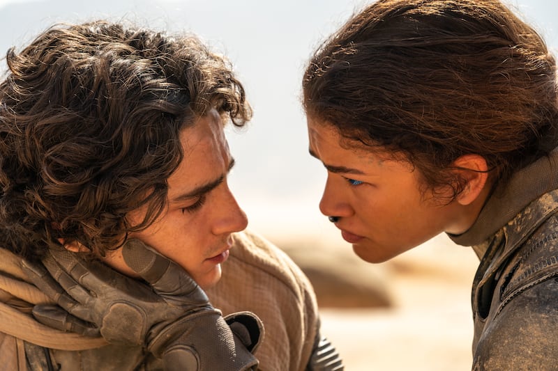 Pictured: (L-r) TIMOTHÉE CHALAMET as Paul Atreides and ZENDAYA as Chani. Picture by Niko Tavernise