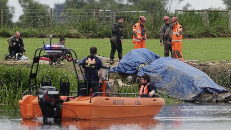 Emergency workers recovered a Ford Orion from the River Bann at the New Ferry Road in Bellaghy, in July. Picture by Liam McBurney/PA Wire 