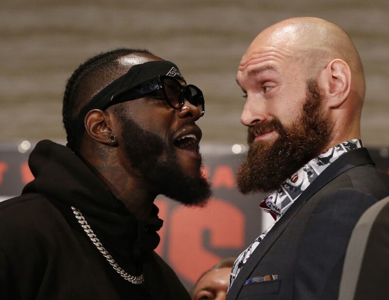 <span style="font-family: Arial, Verdana, sans-serif; ">Boxers Deontay Wilder (left) and Tyson Fury exchange words as they face each other at a news conference in Los Angeles on Wednesday November 28 2018. The pair are slated to fight this Saturday night for Wilder's WBC heavyweight title.&nbsp;</span>