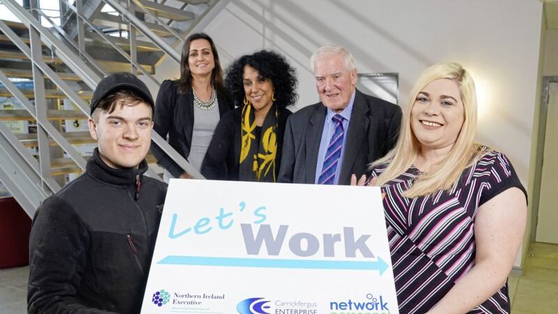 Orla McStravick, director of infrastructure at the Executive Office, Alex McKee, programme manager of Let&rsquo;s Work, and David McIlhagger, vice-chair of Carrickfergus Enterprise, with participants Matthew Witherspoon and Natasha Kenny 