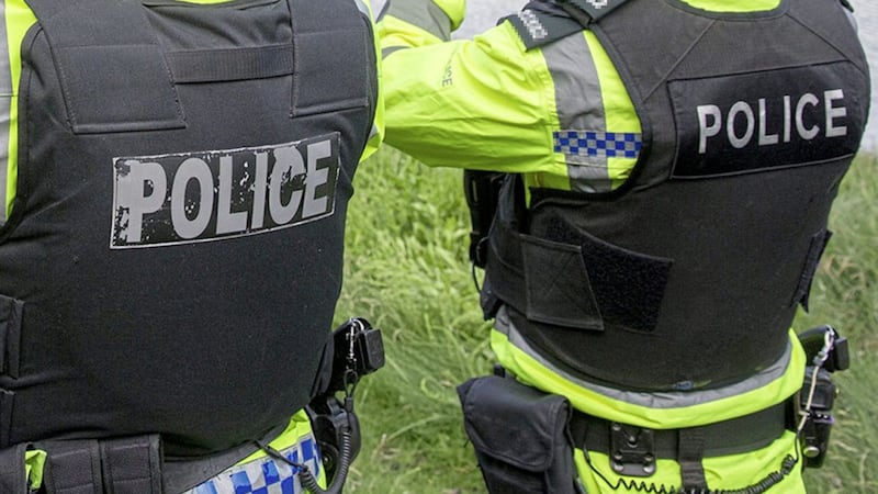 A 25-year-old man was arrested after guns and drugs were found in Ballymena 