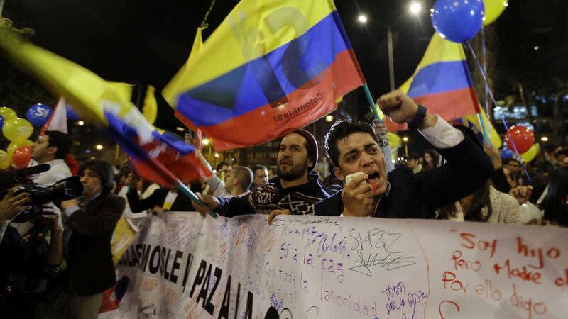People celebrate in Bogota after Colombia&#39;s peace accord. Picture by Fernando Vergara, Associated Press              
