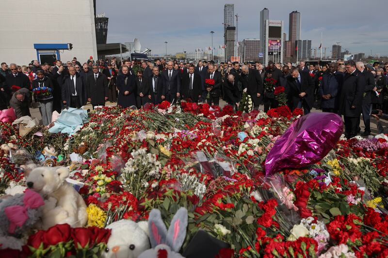 A makeshift memorial has been created in front of Crocus City Hall (Sergei Ilnitsky/Pool Photo via AP)