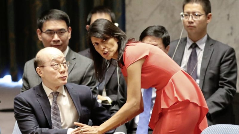 US ambassador to the United Nations Nikki Haley, right, speaks to Chinese ambassador to the United Nations Liu Jieyi before a Security Council vote on a new sanctions resolution that would increase economic pressure on North Korea to return to negotiations on its missile program Picture: Mary Altaffer/AP 