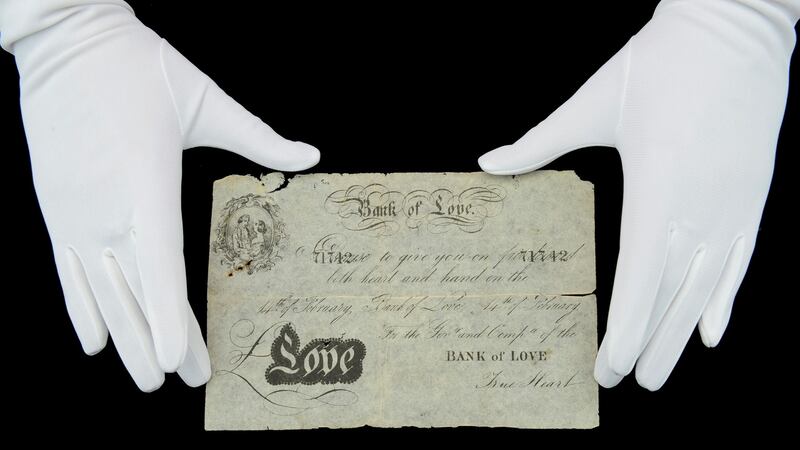 One of the imitation banknotes, to be sold at auction on February 24, was issued by the ‘Bank of Love’.
