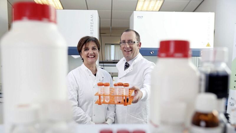 Grainne McVeigh, director of life sciences at Invest Northern Ireland and Paul Kerr, managing director of Fusion Antibodies, set to create 28 new jobs as part of expansion plans 