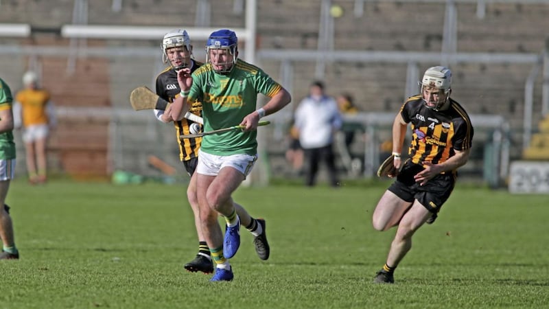 Dunloy&#39;ss Keelan Molloy gets away from Ballycran&#39;s Phelim Savage and Gerard Hughes during yesterday&#39;s Ulster Club semi-final clash at the Athletic Grounds. Picture by Seamus Loughran 