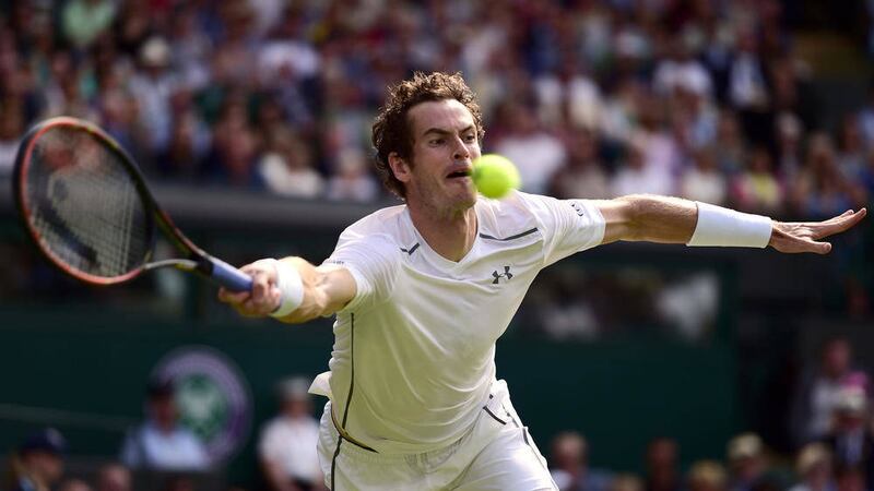 Andy Murray in action during his four-set victory against Ivo Karlovic in Monday&#39;s fourth round tie 
