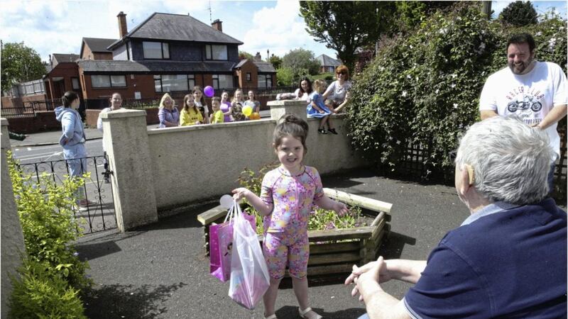 Charlotte Terry celebrated her sixth birthday with the help of friends, neighbours and even strangers outside her Cavehill Road home in north Belfast. Picture by Hugh Russell 