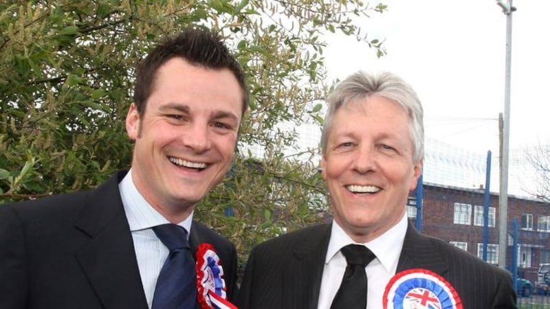 Gareth Robinson with his father, DUP leader Peter Robinson, following his election to Castlreagh council in 2011 