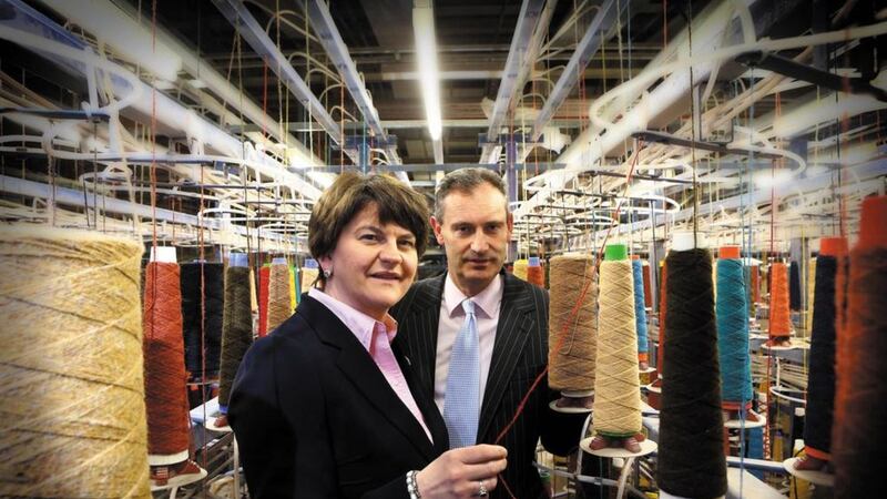 Ulster Carpets managing director, Nick Coburn pictured with the then economy minister Arlene Foster during a visit to the factory 