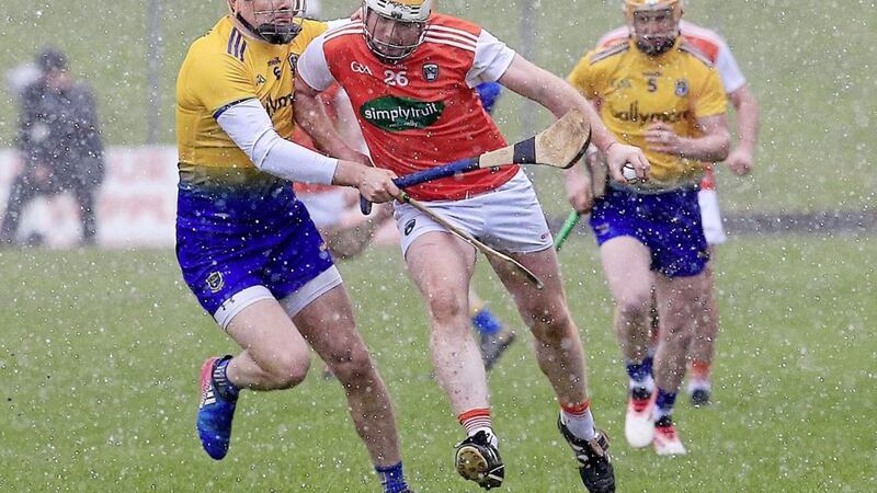 Armagh&#39;s Eoin McGuinness battles with Roscommon Eamon Flanagan at Pairc Tailteann yesterday. Pic Philip Walsh. 