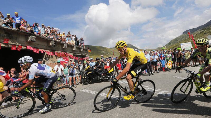 Colombia&#39;s Nairo Quintana, wearing the best young rider&#39;s white jersey, Britain&#39;s Chris Froome, wearing the overall leader&#39;s yellow jersey, and Poland&#39;s Rafal Majka, right, climb Glandon pass during the eighteenth stage of the Tour de France cycling race over 186.5 kilometers (115.9 miles) with start in Gap and finish in Saint-Jean-de-Maurienne 
