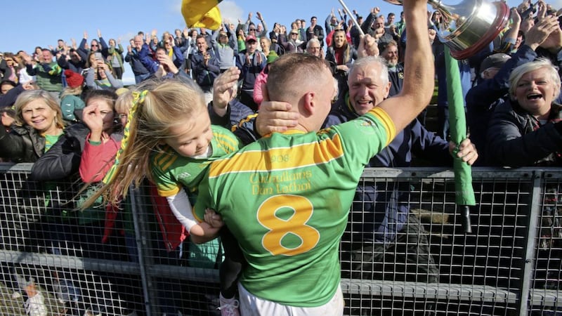 Dunloy&#39;s Paul Shiels celebrates with the cup after defeating Loughgiel Shamrocks Picture Mal McCann. 