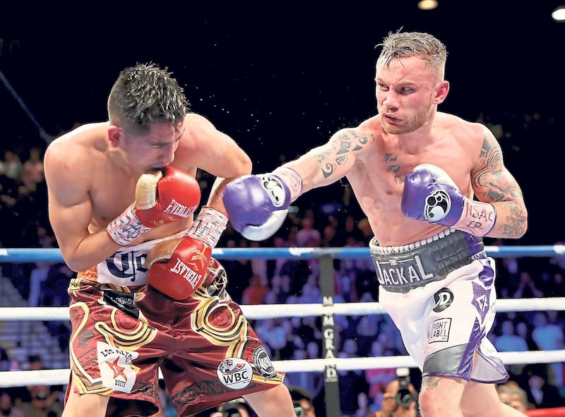 Carl Frampton in the ring with Leo Santa Cruz as they fight for the WBA featherweight title at the MGM Garden Arena, Las Vegas in January 2017. Picture by William Cherry, Presseye