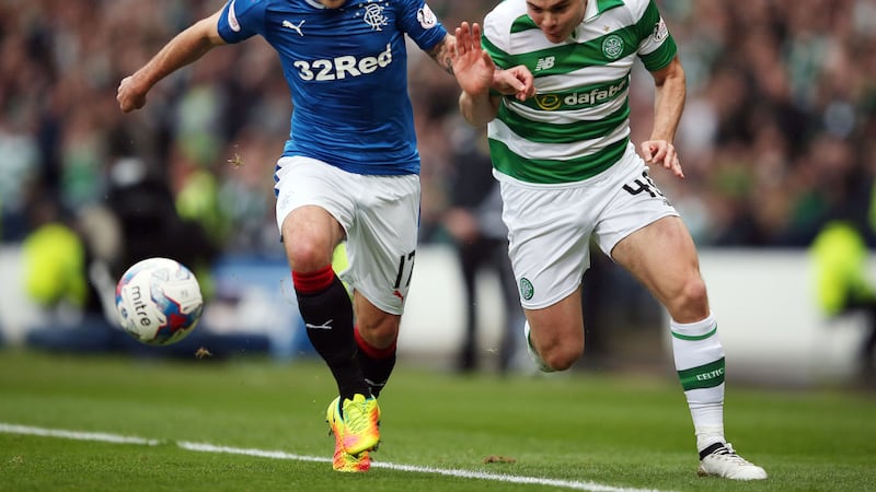 &nbsp;Celtic's James Forrest (right) and Rangers' Lee Hodson battle for the ball during the Betfred Cup, Semi Final match at Hampden Park. Picture by PA
