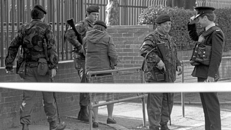 Security forces at the scene of the IRA murder of Mary Travers 