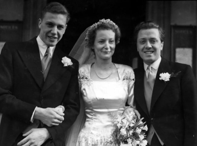 Sir David with wife Jane and brother Richard