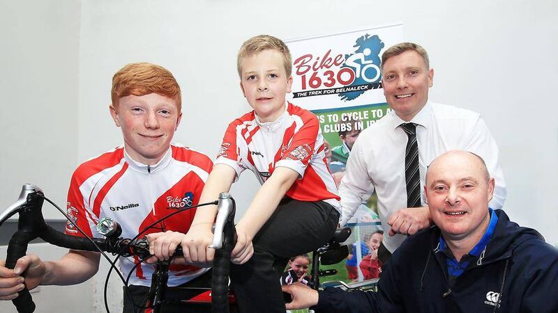 Monaghan Manager Malachy O Rourke getting behind Bike 1630 with representatives from Bike 1630/Belnaleck 