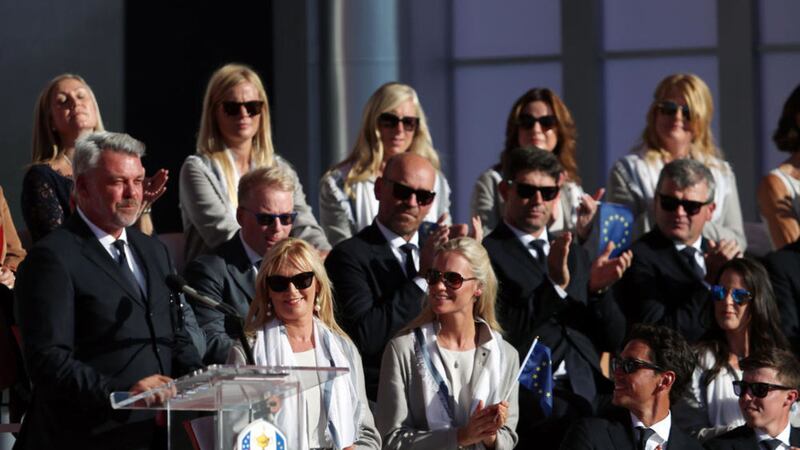 Europe team captain Darren Clarke gives a speech next to his wife Alison (second left) during the opening ceremony for the Ryder Cup in Minnesota.&nbsp;