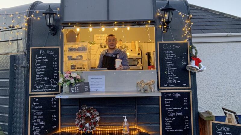 Ross Kelly serves up a coffee from his converted horse box 