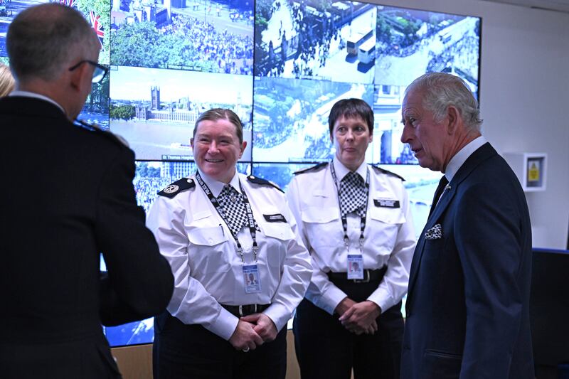 King Charles speaks to Deputy Assistant Commissioner Jane Connors (second right), Commander Karen Findlay (second left) and Commissioner Mark Rowley (left) during a visit to the Metropolitan Police Service Special Operations Room.