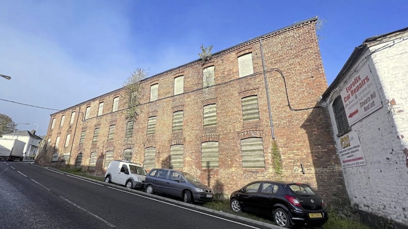 Belfast City Council is considering plans to demolish a former linen mill and build apartments in Dunmurry. Picture by Hugh Russell. 