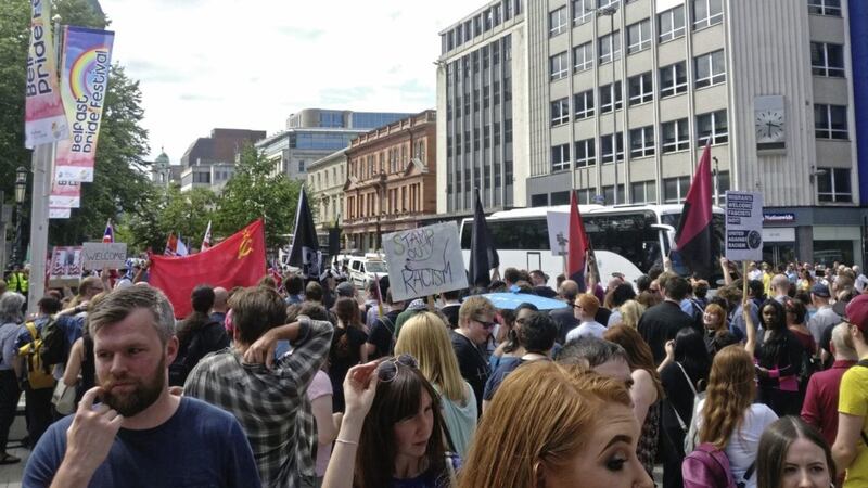 Around 400 people attend a &#39;UK Freedom Rally&#39; and counter protest at Belfast city hall 