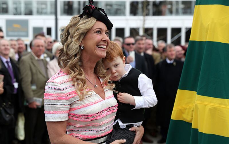 Chanelle McCoy and Archie McCoy during Champion Day of the 2017 Cheltenham Festival at Cheltenham Racecourse as the statue depicting AP McCoy was unveiled&nbsp;